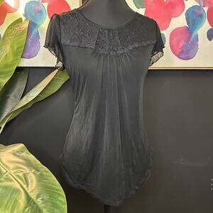 Y2K 2000s black lace top with sheer sleeves and a flowy fit #goth #lace #y2k